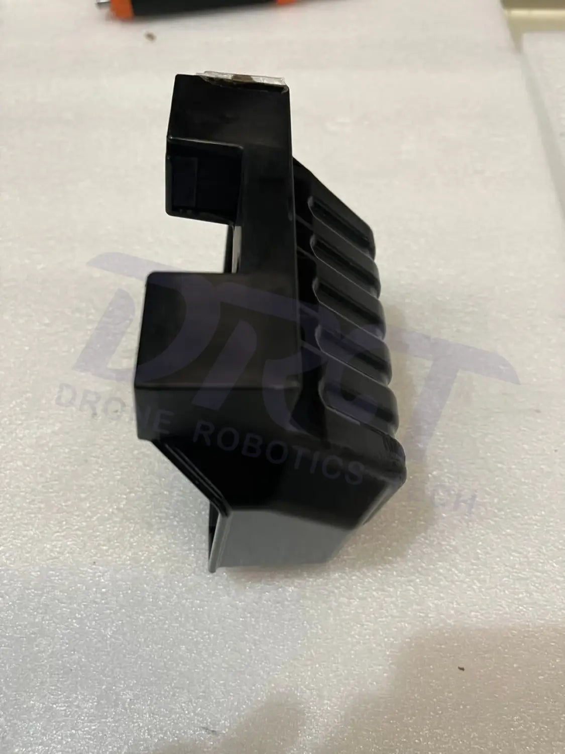 YC.DZ.GR000571-D12500iE - Power Plug Fixing Block (ZS)